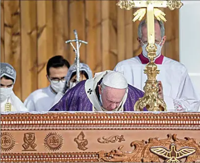  ?? ANDREW MEDICHINI / AP ?? Pope Francis celebrates Mass at the Franso Hariri Stadium in Irbil, Kurdistan Region of Iraq, Sunday.