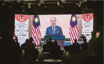  ?? PIC BY ASWADI ALIAS. ?? Prime Minister Tan Sri Muhyiddin Yassin closing the inaugural TVET Expo and Summit 2021 in a prerecorde­d video, in Kuala Lumpur yesterday.