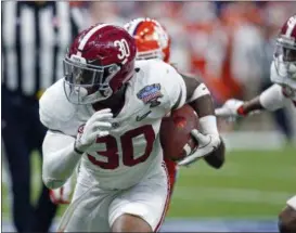  ?? BUTCH DILL — ASSOCIATED PRESS ?? Alabama linebacker Mack Wilson intercepts a pass and returns it for a touchdown during the second half of the Sugar Bowl against Clemson on Jan. 1 in New Orleans.