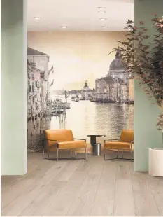  ??  ?? ABK offers the Nuovi Mondi capsule collection of large-format ceramic tiles digitally printed with painterly landscapes.