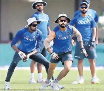  ?? REUTERS ?? India captain Virat Kohli (R) with Hardik Pandya at their training session in Galle on Tuesday.