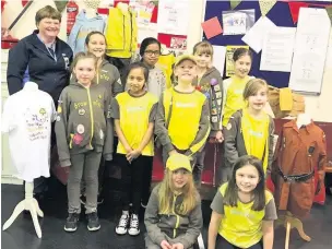  ??  ?? The 1st Rossendale Brownies with their Brown Owl Valerie Baglow