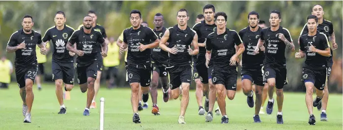  ??  ?? Los jugadores de América, en una sesión de entrenamie­nto