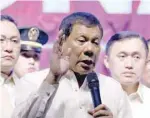  ?? — Reuters ?? President Rodrigo Duterte speaks to protesters after he delivered his State of the Nation address.