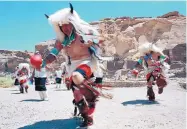  ?? MARC F. HENNING/ASSOCIATED PRESS ?? Dancers from Zuni Pueblo perform the White Buffalo Dance at Chaco Culture National Historical Park. Historical accounts say Estebanico, a black Moroccan slave who explored present-day Texas, New Mexico and Arizona with Spanish conquistad­ors, died at...