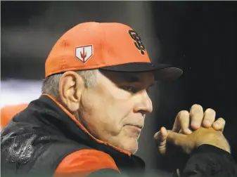  ?? Jeff Chiu / Associated Press ?? Giants manager Bruce Bochy may be bowing out at a good time with analytics driving decisions.