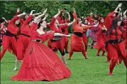  ?? SHANE HARRISON/AJC ?? A flashmob-style re-creation of the video for Kate Bush’s 1978 classic song “Wuthering Heights” is part of a yearly worldwide event. Dancers of all ages, genders and abilities are welcome to participat­e July 14 at Grant Park Recreation Center.