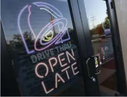  ?? GERALD HERBERT/THE ASSOCIATED PRESS FILE PHOTO ?? Taco Bell recently relaunched its popular “chicken chips” in Canada, which are crispy triangles of marinated white-meat chicken with warm nacho cheese sauce.