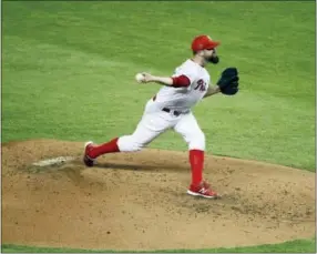  ?? WILFREDO LEE — THE ASSOCIATED PRESS ?? The National League’s Pat Neshek, of the Phillies, delivers in the second inning of Tuesday’s All-Star Game in Miami