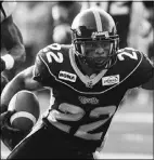  ?? Fred Thornhil, Reuters ?? Former Hamilton Tiger-cats running back Avon Cobourne runs for a first down against the Toronto Argonauts
last August.