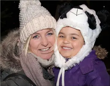  ??  ?? Fiona and Sianne Bent at the switching on of the Christmas Lights in Rosslare Strand on Sunday evening.