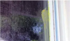  ?? WXIA-TV ATLANTA ?? Jarrell Pealer’s window has a splat of yellow from a paintball battle a few weeks back.