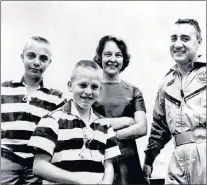  ?? AP FILE PHOTO ?? Astronaut Virgil “Gus” Grissom is reunited with his wife, Betty, and sons Scott, 14, and Mark, 11, at Cape Kennedy, Fla., after his three-orbit flight in March 1965.