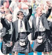  ??  ?? Darren Jackson (centre) with physio Hugh Allan and Jonathan Gould on the Stade de France pitch before the opening game at France 98