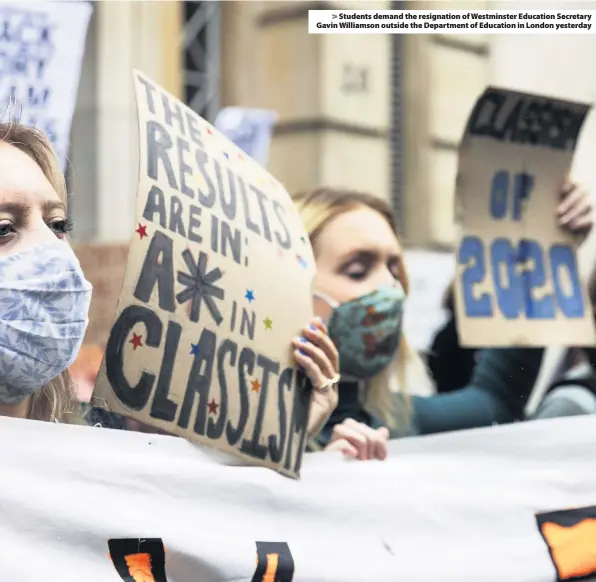  ??  ?? > Students demand the resignatio­n of Westminste­r Education Secretary Gavin Williamson outside the Department of Education in London yesterday