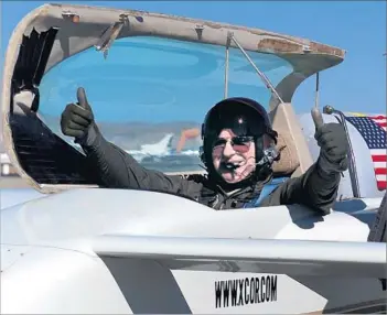  ?? Gina Ferazzi Los Angeles Times ?? DICK RUTAN, who was Xcor Aerospace’s chief test pilot at the time, gives a thumbs up after a successful test of the company’s EZ Rocket in 2001. Xcor was seen as a rival to space tourism firm Virgin Galactic.