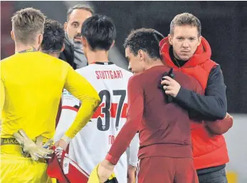  ?? FOTO: FRANK HOERMANN/IMAGO IMAGES ?? Seine eigene Bilanz stimmt Bayerns Trainer Julian Nagelsmann (re.) bislang zufrieden.