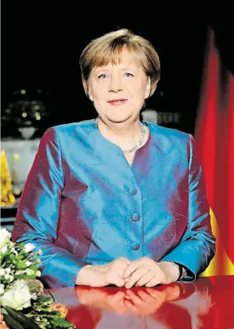  ?? Kancléřka Merkelová ujistila Němce, že se stát zasadí o jejich bezpečnost. FOTO ČTK/ AP ?? Zajistit bezpečnost.