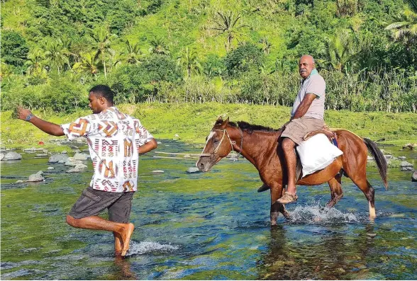  ?? DEPTFO ?? Assistant Minister in the Office of the Prime Minister Sakiusa Tubuna braved the two-hour travel on horseback on Easter Monday in Nasava. Photo: