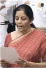  ?? — Reuters ?? Nirmala Sitharaman takes the oath during the swearing-in ceremony of new ministers in New Delhi.