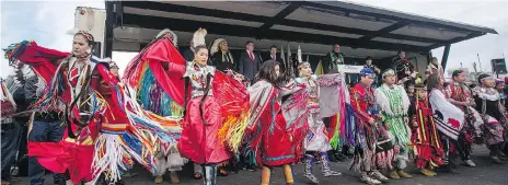  ?? LIAM RICHARDS ?? Dancers take the spotlight during a ceremony at Chief Mistawasis Bridge on Tuesday.