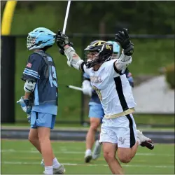  ?? KYLE FRANKO — TRENTONIAN PHOTO ?? Hopewell Valley’s Lucas Gaissert (3) celebrates at the end of an 8-7 victory over Notre Dame during a Mercer County Tournament semifinal boys lacrosse game on Tuesday night at Ackerson Field in Hopewell Twp.