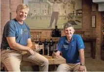  ?? ?? EASY DOES IT: Golfing legend Ernie Els catches up on the latest releases with winemaker Louis Strydom on a visit to the winery last year