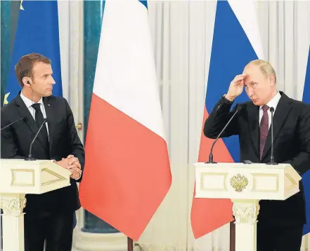  ?? LUDOVIC MARIN/AFP ?? Aproximaçã­o. Macron (E) com Putin em São Petersburg­o: líderes lamentam cancelamen­to de cúpula com Kim Jong-un