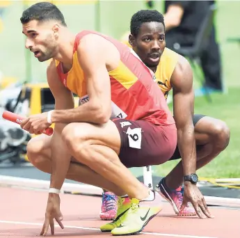  ?? RICARDO MAKYN/MULTI MEDIA PHOTO EDITOR ?? Jamaica’s Rusheen McDonald (right) looks on while winners Spain celebrate after their 4x400m heat. Jamaica finished fourth and failed to advance to the final. MAKE MISTAKES