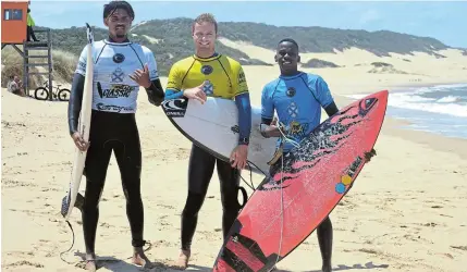  ?? Picture: MARK CARRELS ?? SO STOKED: KwaZulu-Natal’s Ntando Msibi, right, celebrates his victory with Joshe Faulkner (fourth) left, and Thomas Lindhorst (third) in the men’s open surfing final at the Royal St Andrews Hotel Amanzi Challenge on Sunday at Port Alfred’s East Beach.