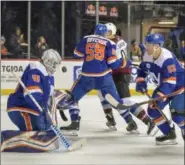  ?? HOWARD SIMMONS - THE ASSOCIATED PRESS ?? New York Islanders goaltender Robin Lehner (40) blocks high shot during the first period of an NHL hockey game against the Colorado Avalanche, Saturday, Feb. 9, 2019, in New York.