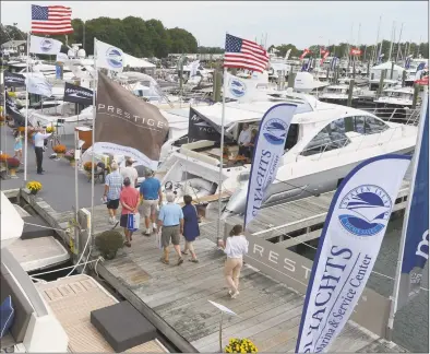  ?? Hearst Connecticu­t Media file photo ?? Visitors stroll the docks at the September 2017 Progressiv­e Insurance Norwalk Boat Show.