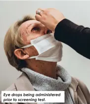  ?? ?? Eye drops being administer­ed prior to screening test.