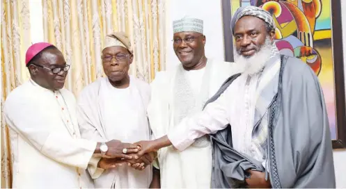  ?? PHOTO: AMO ?? From left: Catholic Bishop of Sokoto, Bishop Matthew Hassan Kukah; former President Olusegun Obasanjo; Presidenti­al candidate of PDP, former Vice President Atiku Abubakar and Sheikh Ahmed Gumi, during the end of a meeting between Obasanjo and Atiku at the Olusegun Obasanjo Presidenti­al Library in Abeokuta, Ogun State on October 11