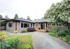  ??  ?? This Tsawwassen home at 1098 Ferguson Rd. was built in 1965 on a 60-by-120-foot lot and has received extensive updates and upgrades since.