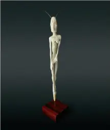  ?? COURTESY HOME & AWAY GALLERY ?? LEFT Paallenget­aq(butterfly spirit)2010Ivory and seal whiskers 30.48 × 5.1 × 2.5 cm