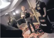  ?? SOURCE: LAS VEGAS METROPOLIT­AN POLICE DEPARTMENT ?? Body camera footage released Wednesday shows police officers searching hallways in the Mandalay Bay Hotel in Las Vegas during the Oct. 1, 2017, mass killing.