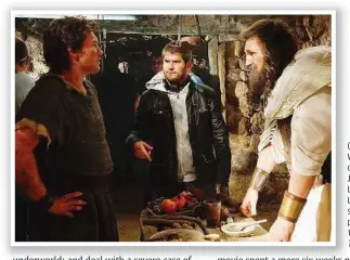  ??  ?? (From left) Sam Worthingto­n, director Jonathan Liebesman and Liam Neeson on set during the production of