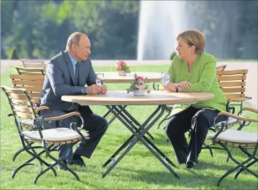  ?? [ AFP ] ?? Zumindest war in Berlin beim Gespräch von Putin und Merkel das Wetter ähnlich gut wie in der Steiermark.