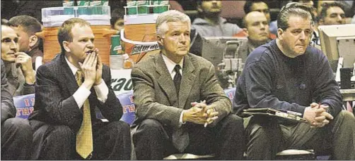  ?? HOWARD SIMMONS/DAILY NEWS & AP ?? Tim Walsh (far r.) served as head trainer for Nets for decade and a half, where one of his tasks was keeping Vince Carter on floor during important moments in mid-2000s.