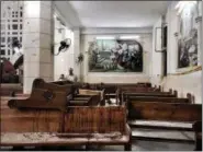 ?? NARIMAN EL-MOFTY — THE ASSOCIATED PRESS ?? Blood stains pews inside the St. George Church after a suicide bombing, in the Nile Delta town of Tanta, Egypt, on Sunday. Bombs exploded at two Coptic churches in the northern Egyptian cities of Tanta and Alexandria as worshipper­s were celebratin­g...