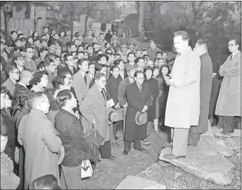  ?? / AP, File ?? Jacob DeShazer, who was one of the Doolittle airmen who raided Tokyo, holds an outdoor missionary meeting in Tokyo on Jan. 24, 1950. DeShazer, who worked as a free Methodist missionary in Japan, estimated he converted possibly 30,000 of the 120,000 who heard him speak at 420 separate services in 1949.