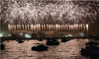  ?? — AFP ?? Fireworks light the sky during the celebratio­ns marking the opening of the Sheikh Jaber al-Ahmad grand cultural centre in Kuwait City on Saturday.