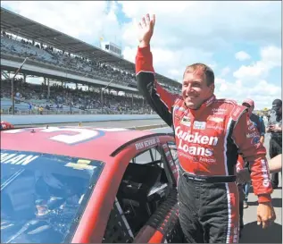  ?? DOUG MCSCHOOLER/AP PHOTO ?? Ryan Newman waves to the fans Saturday after qualifying for the pole position for today’s NASCAR Sprint Cup Brickyard 400 race at Indianapol­is Motor Speedway.