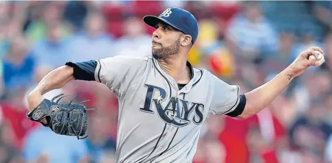  ?? AFP ?? The Rays’ David Price pitches during the first inning of his team’s victory against the Boston Red Sox at Fenway Park on Monday.