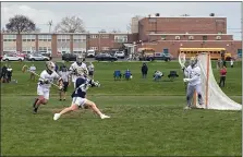  ?? MIKE CABREY — MEDIANEWS GROUP ?? La Salle’s Andrew Kelly (1) scores in the first quarter against Lansdale Catholic on Tuesday, April 26, 2022.