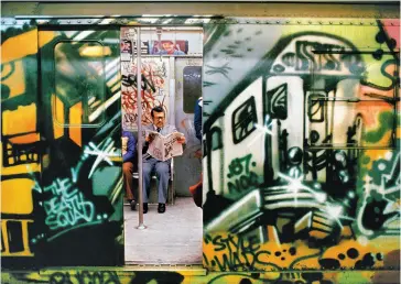  ??  ?? graffiti as art: A subway car graffitied by NOC 167 reaches 96th Street, 1981.