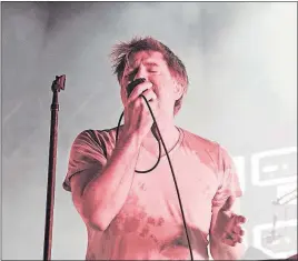  ?? [AMY HARRIS/INVISION] ?? LCD Soundsyste­m’s James Murphy, performing in July in Louisville, Ky.