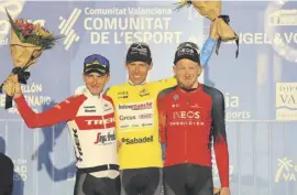  ?? ?? A victorious Rui Costa (centre) flanked by Giulio Ciccone (L) and Tao Geoghegan Hart