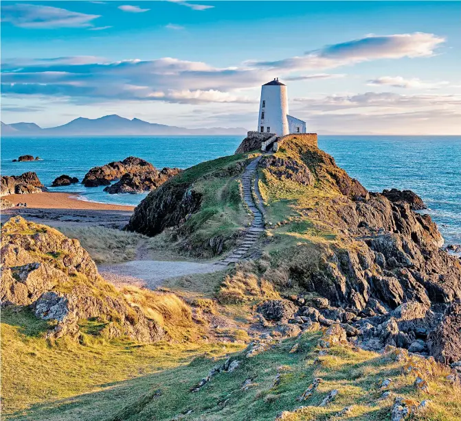  ??  ?? TO THE LIGHTHOUSE Llanddwyn, a favourite haunt of Prince William